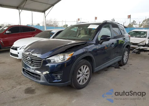 2016 Mazda Cx-5 Touring z USA, uszkodzony, nr VIN JM3KE2CY0G0726448